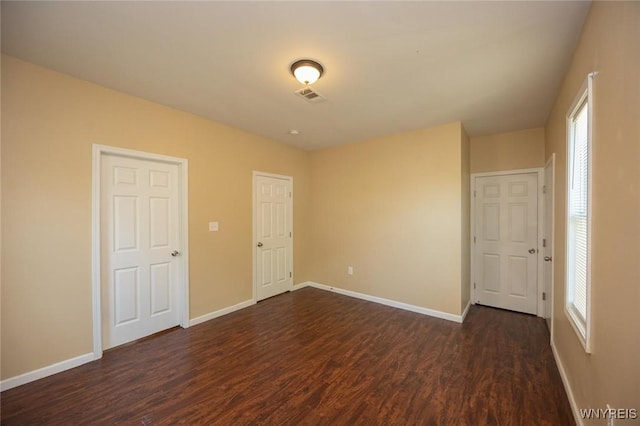 54 Tuxedo Pl, Buffalo, NY 14207 - unfurnished bedroom with dark wood finished floors and baseboards
