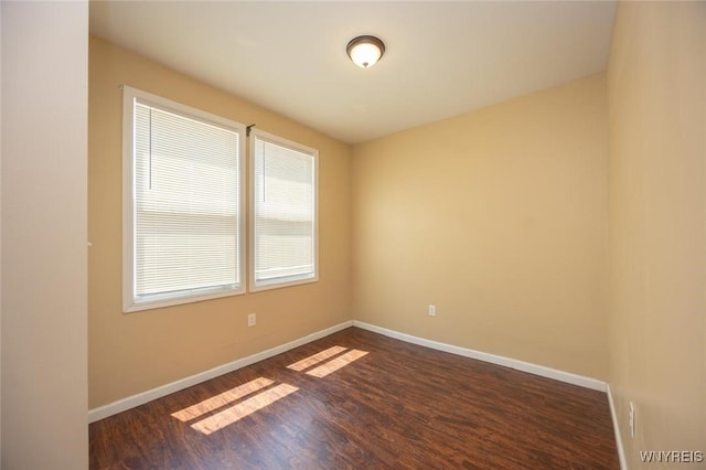 54 Tuxedo Pl, Buffalo, NY 14207 - empty room with baseboards and dark wood finished floors