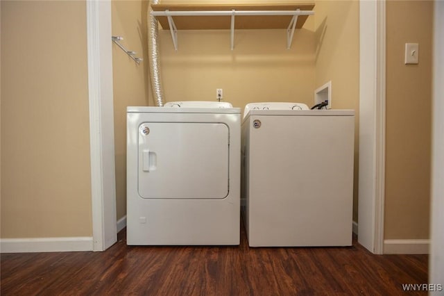 54 Tuxedo Pl, Buffalo, NY 14207 - washroom featuring washing machine and clothes dryer and wood finished floors