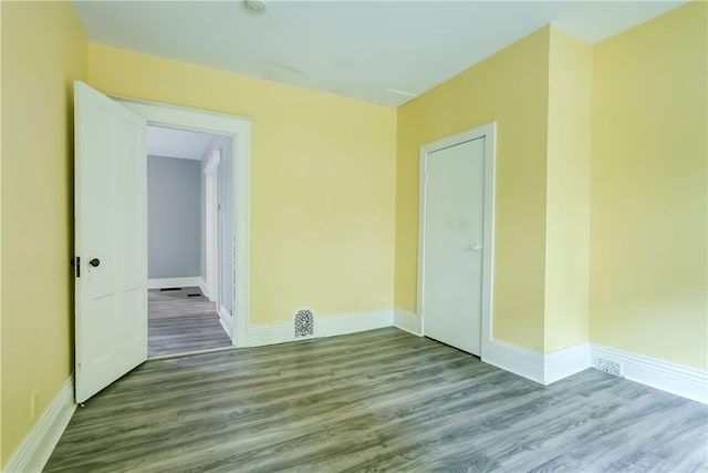 26 Fountain St, Rochester, NY 14620 - unfurnished room with wood finished floors and baseboards
