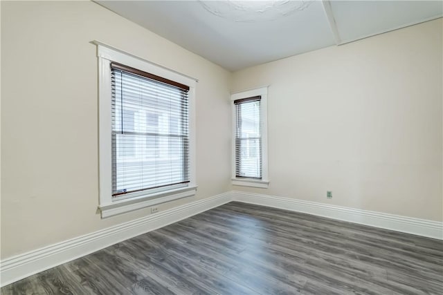 26 Fountain St, Rochester, NY 14620 - spare room with dark wood-style flooring