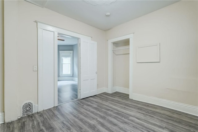 26 Fountain St, Rochester, NY 14620 - unfurnished bedroom with wood finished floors and a closet