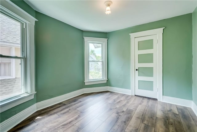 26 Fountain St, Rochester, NY 14620 - spare room featuring wood finished floors