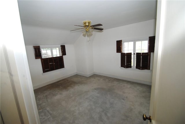 11 Elmwood Ave, Hornellsville, NY 14843 - carpeted spare room featuring healthy amount of natural light, ceiling fan, and lofted ceiling