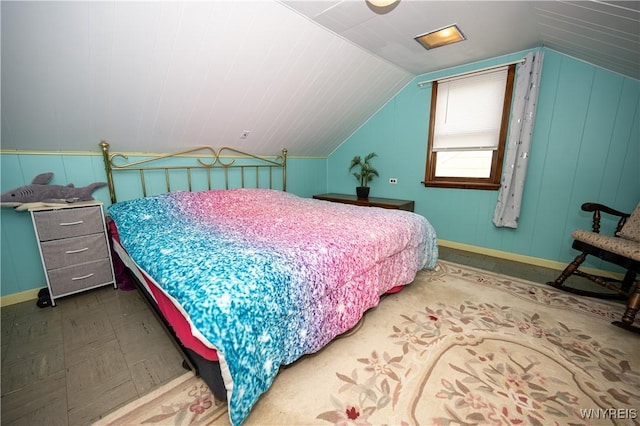 150 Collins Ave, West Seneca, NY 14224 - bedroom with lofted ceiling and a decorative wall