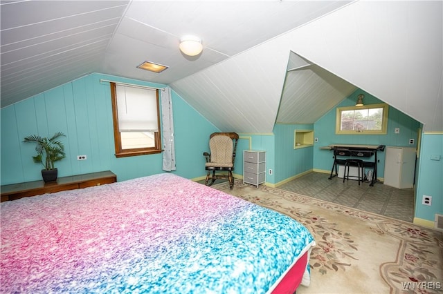 150 Collins Ave, West Seneca, NY 14224 - bedroom with baseboards and vaulted ceiling
