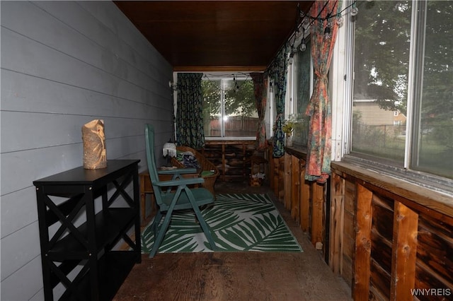 150 Collins Ave, West Seneca, NY 14224 - sunroom / solarium featuring wood walls and wood finished floors