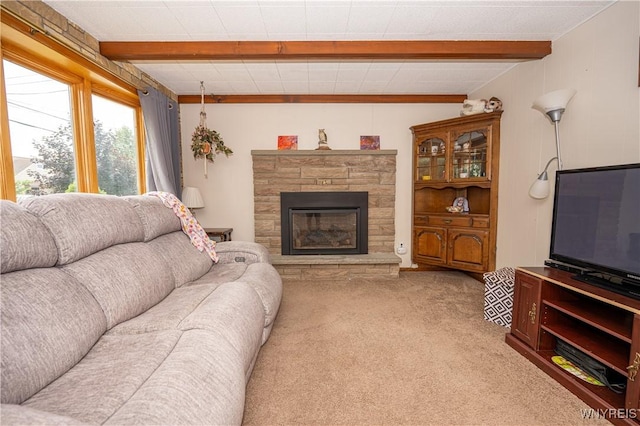 150 Collins Ave, West Seneca, NY 14224 - living room with beam ceiling, light colored carpet, and a stone fireplace