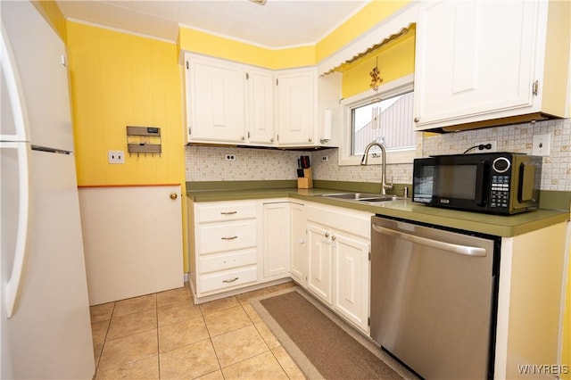 150 Collins Ave, West Seneca, NY 14224 - kitchen featuring dishwasher, freestanding refrigerator, black microwave, backsplash, and white cabinets