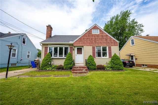 150 Collins Ave, West Seneca, NY 14224 - view of front facade featuring a chimney and a front lawn