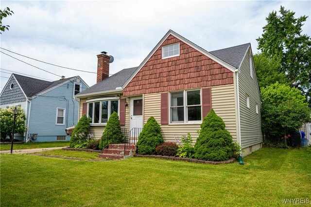 150 Collins Ave, West Seneca, NY 14224 - view of front facade with a chimney, a front lawn, and roof with shingles