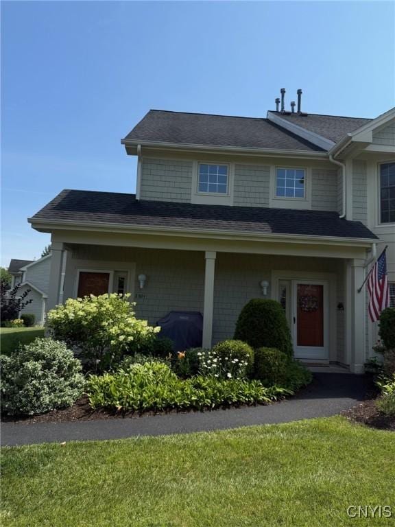 2301 Greymoor Way, Lysander, NY 13027 - view of front of house featuring a front lawn and a shingled roof