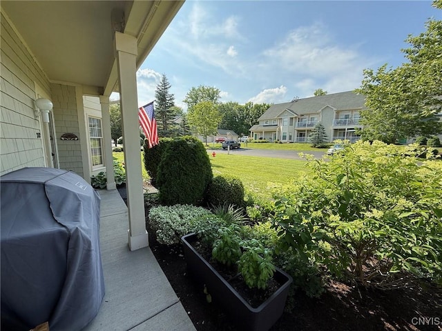 2301 Greymoor Way, Lysander, NY 13027 - view of green lawn with a porch and a residential view
