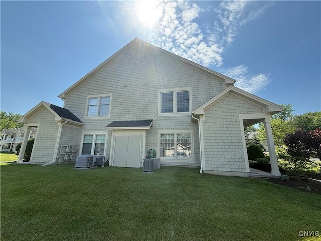 2301 Greymoor Way, Lysander, NY 13027 - back of house featuring a yard