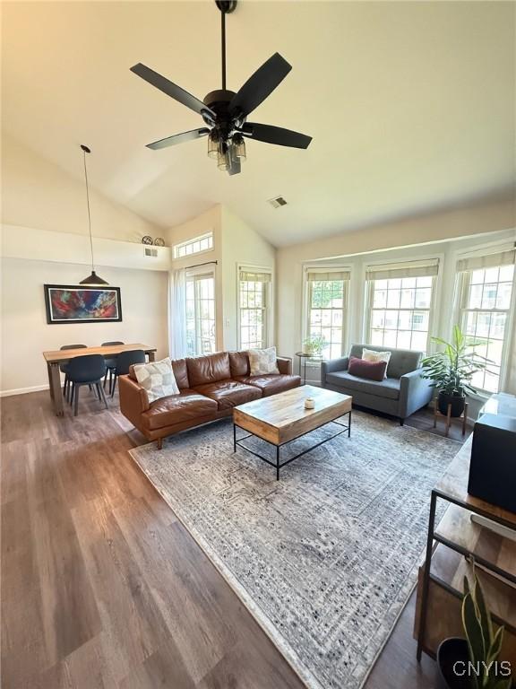 2301 Greymoor Way, Lysander, NY 13027 - living room featuring wood finished floors, ceiling fan, and high vaulted ceiling