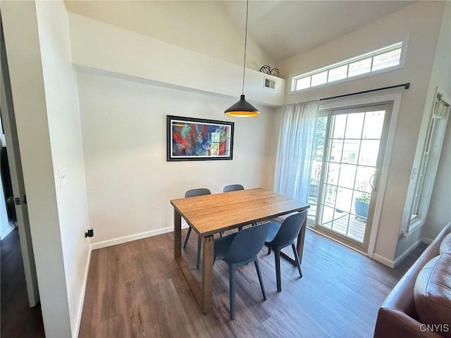 2301 Greymoor Way, Lysander, NY 13027 - dining area with dark wood-type flooring and high vaulted ceiling