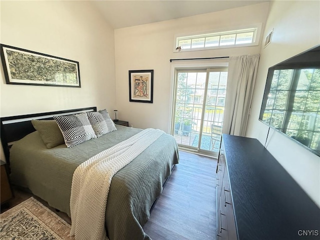 2301 Greymoor Way, Lysander, NY 13027 - bedroom featuring access to outside and wood finished floors