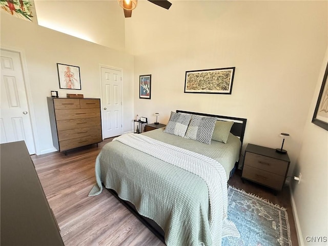 2301 Greymoor Way, Lysander, NY 13027 - bedroom with wood finished floors and ceiling fan