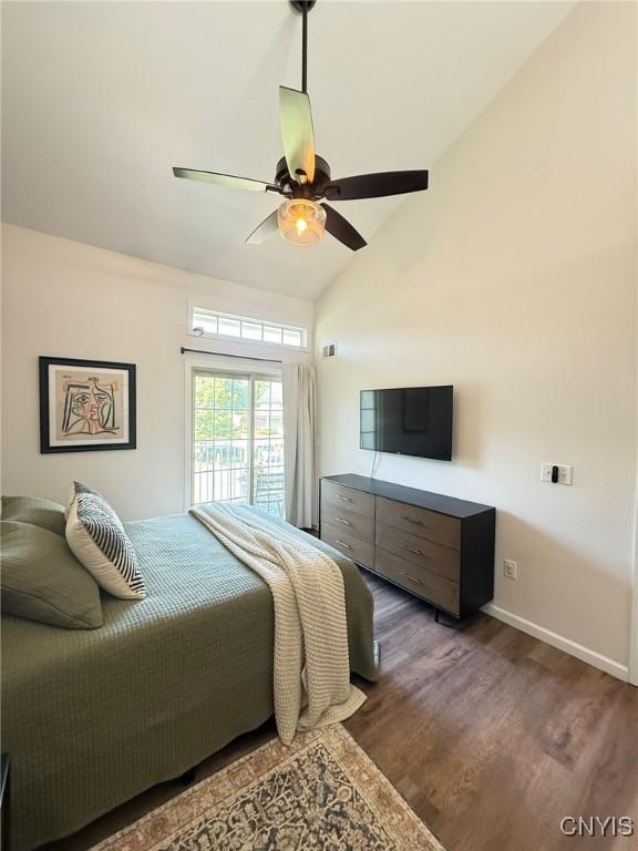 2301 Greymoor Way, Lysander, NY 13027 - bedroom with wood finished floors, ceiling fan, access to exterior, and high vaulted ceiling