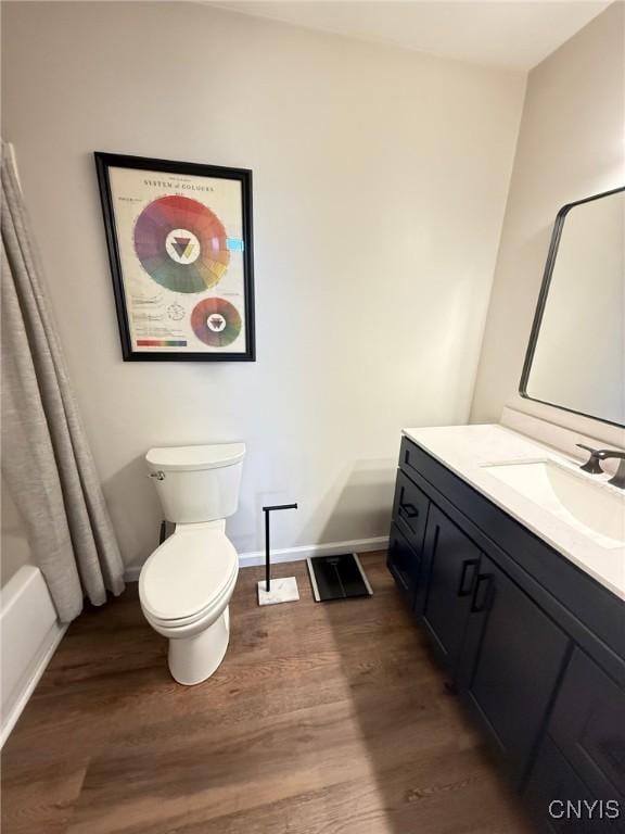 2301 Greymoor Way, Lysander, NY 13027 - bathroom with vanity, wood finished floors, and shower / bath combo