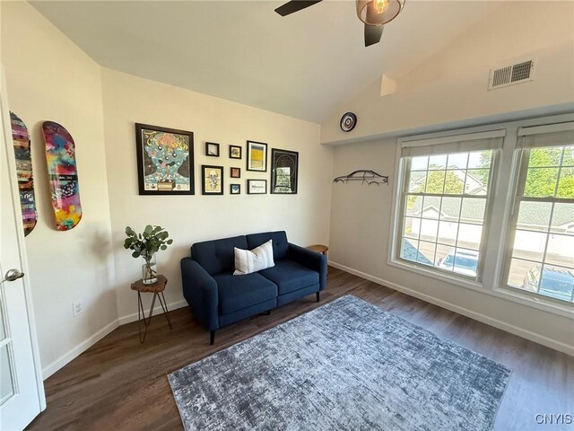 2301 Greymoor Way, Lysander, NY 13027 - living area featuring dark wood finished floors, ceiling fan, and high vaulted ceiling