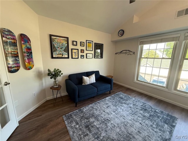 2301 Greymoor Way, Lysander, NY 13027 - living area with dark wood-style floors and lofted ceiling