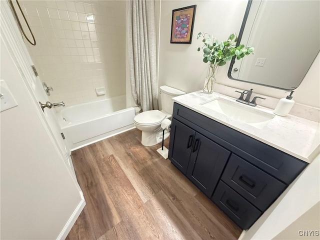 2301 Greymoor Way, Lysander, NY 13027 - bathroom featuring wood finished floors, vanity, and shower / bath combo with shower curtain