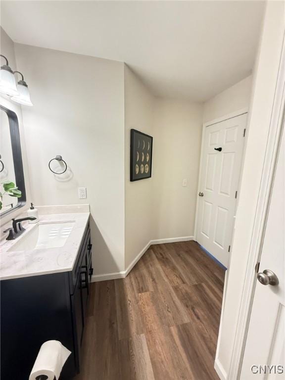 2301 Greymoor Way, Lysander, NY 13027 - bathroom with wood finished floors and vanity