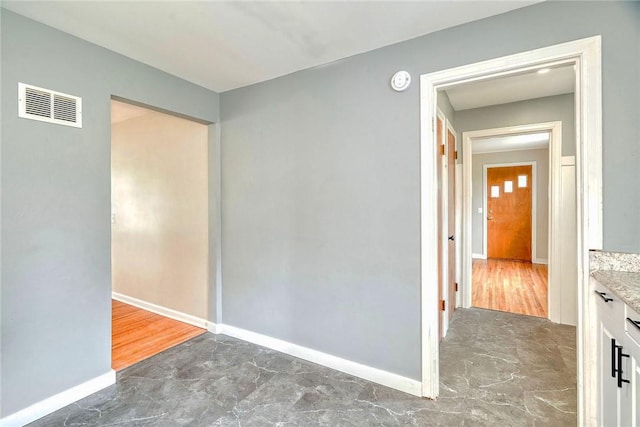 2862 Culver Rd, Irondequoit, NY 14622 - unfurnished room with baseboards and a smoke detector