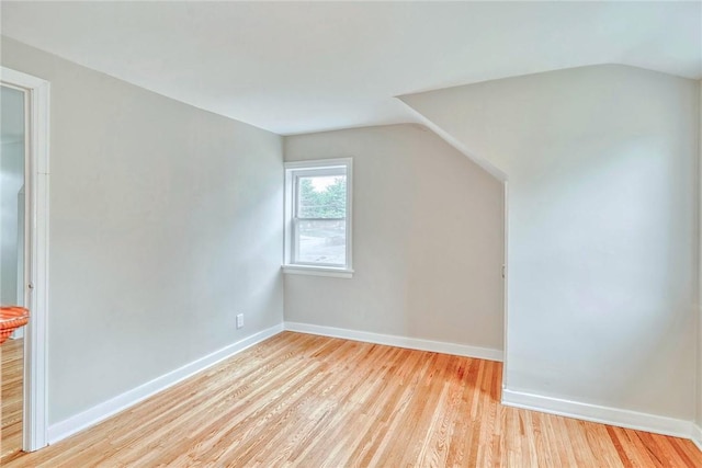 2862 Culver Rd, Irondequoit, NY 14622 - additional living space featuring lofted ceiling and light wood-style floors