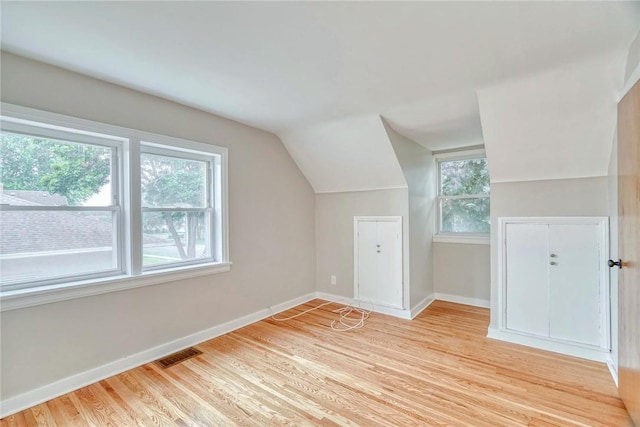 2862 Culver Rd, Irondequoit, NY 14622 - additional living space with lofted ceiling and light wood-type flooring