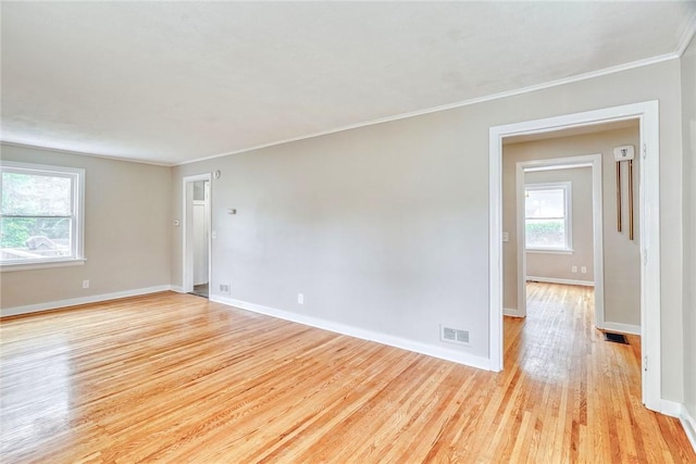 2862 Culver Rd, Irondequoit, NY 14622 - unfurnished room with light wood-style floors and crown molding