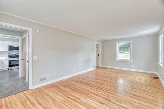 2862 Culver Rd, Irondequoit, NY 14622 - unfurnished room featuring light wood-style floors, ornamental molding, and a smoke detector