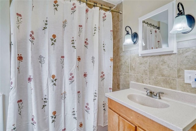 2862 Culver Rd, Irondequoit, NY 14622 - bathroom with vanity, tile walls, a shower with shower curtain, and tasteful backsplash