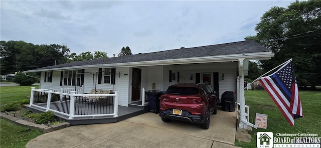 1710 Haskell Pkwy, Portville, NY 14760 - view of front of house featuring covered porch, a front lawn, and a carport