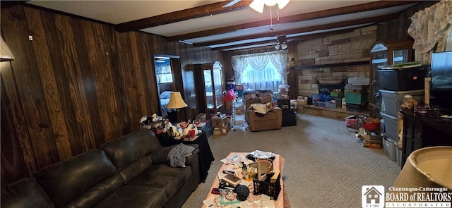 1710 Haskell Pkwy, Portville, NY 14760 - carpeted living room featuring a ceiling fan, wood walls, and beamed ceiling