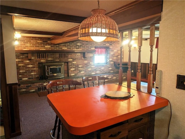310 E Green St, Smethport Boro, PA 16749 - dining room with carpet flooring, beam ceiling, and brick wall