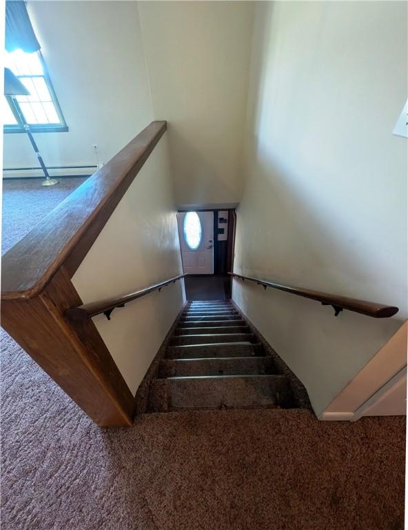 310 E Green St, Smethport Boro, PA 16749 - stairs featuring carpet flooring, plenty of natural light, baseboard heating, and a high ceiling