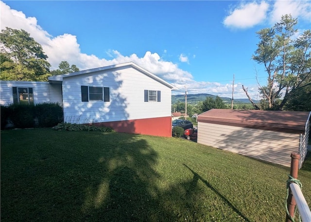 310 E Green St, Smethport Boro, PA 16749 - view of home's exterior with a lawn