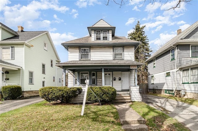 430 Ridgeway Ave, Rochester, NY 14615 - traditional style home with covered porch, a front yard, and a shingled roof