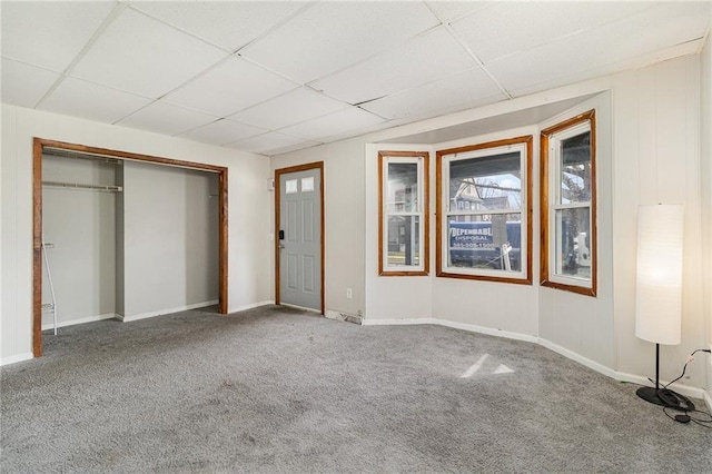 430 Ridgeway Ave, Rochester, NY 14615 - unfurnished bedroom with a paneled ceiling, carpet flooring, and a closet