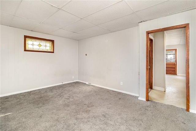 430 Ridgeway Ave, Rochester, NY 14615 - carpeted empty room with a paneled ceiling and wooden walls