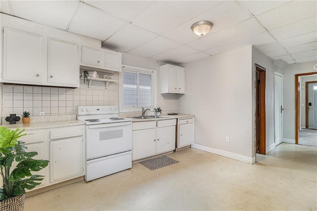 430 Ridgeway Ave, Rochester, NY 14615 - kitchen with white range with electric cooktop, a drop ceiling, light countertops, white cabinets, and open shelves