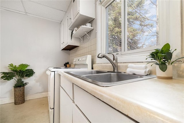 430 Ridgeway Ave, Rochester, NY 14615 - laundry room featuring baseboards and independent washer and dryer