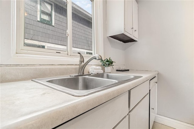 430 Ridgeway Ave, Rochester, NY 14615 - kitchen with white cabinetry and light countertops