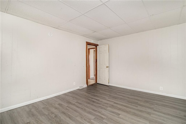 430 Ridgeway Ave, Rochester, NY 14615 - spare room with wood finished floors and a paneled ceiling
