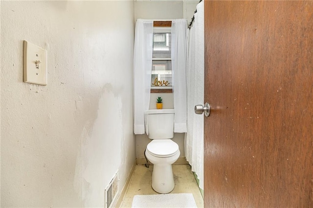 430 Ridgeway Ave, Rochester, NY 14615 - bathroom featuring toilet and baseboards