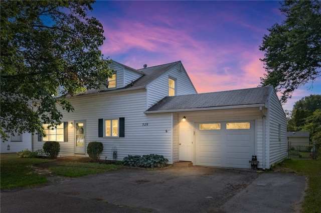 529 Fetzner Rd, Greece, NY 14626 - view of front facade with an attached garage and driveway