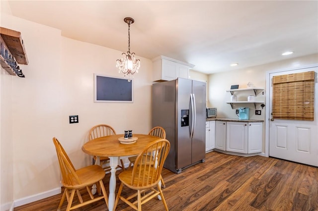 529 Fetzner Rd, Greece, NY 14626 - dining area featuring a chandelier, dark wood-style floors, and recessed lighting