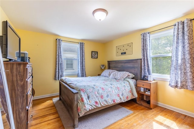 529 Fetzner Rd, Greece, NY 14626 - bedroom with light wood-style flooring and baseboards